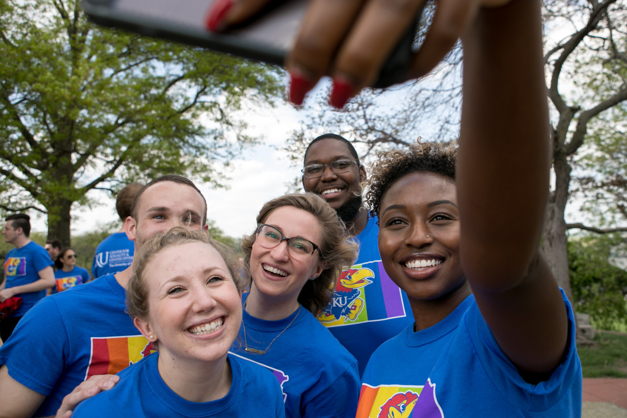 Students at an event take a selfie