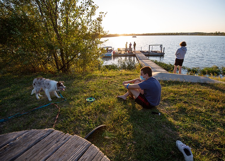 Students spending time at lakeside